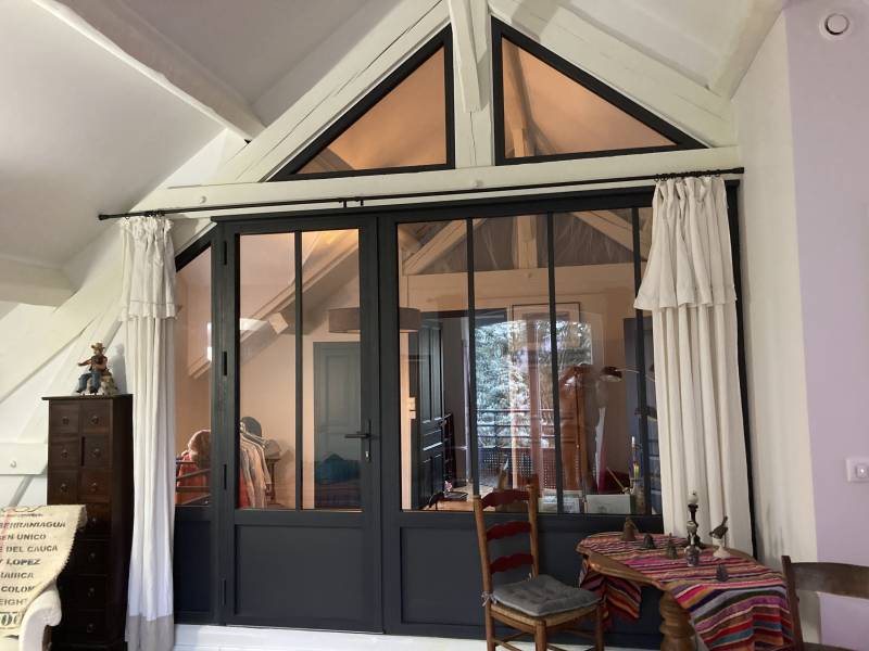 Création sur mesure de verrière en aluminium avec porte intégrée à Saint-Martin-en-Haut