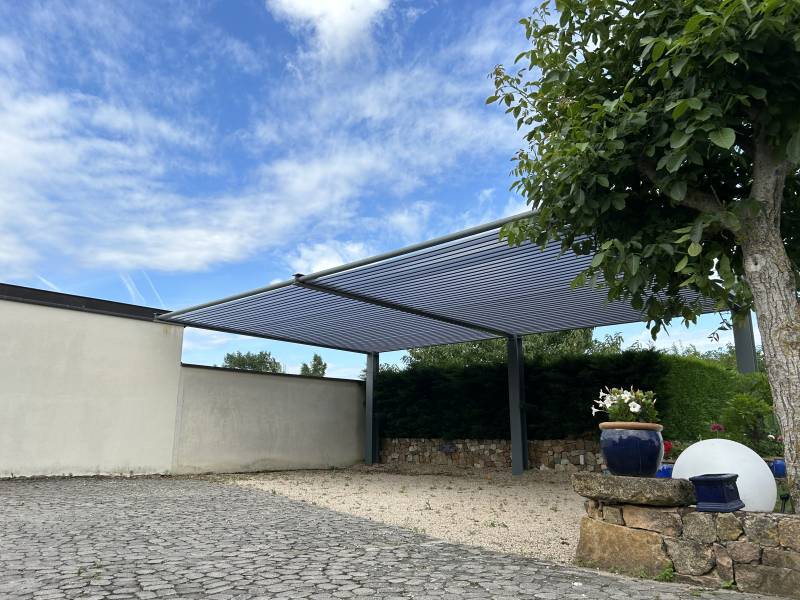 Pose d'une carport pour deux voiture 