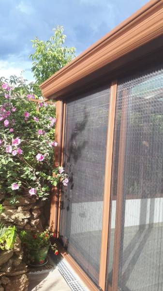 Installation de moustiquaire pour baie vitrée à Genilac, proche de Saint-Martin-la-Plaine et Rive-de-Gier